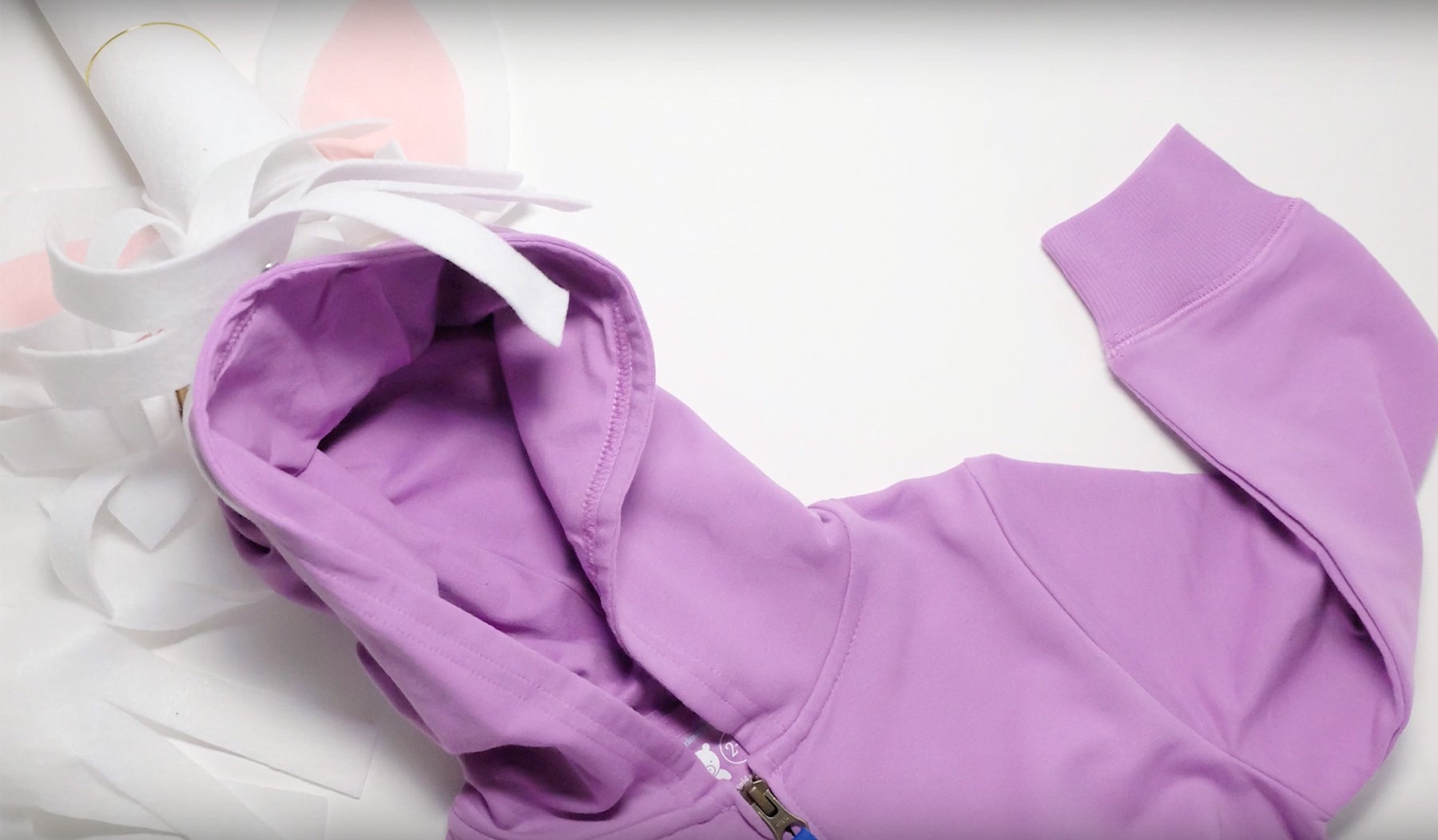 childs purple hoodie sweatshirt that is the base of DIY unicorn costume